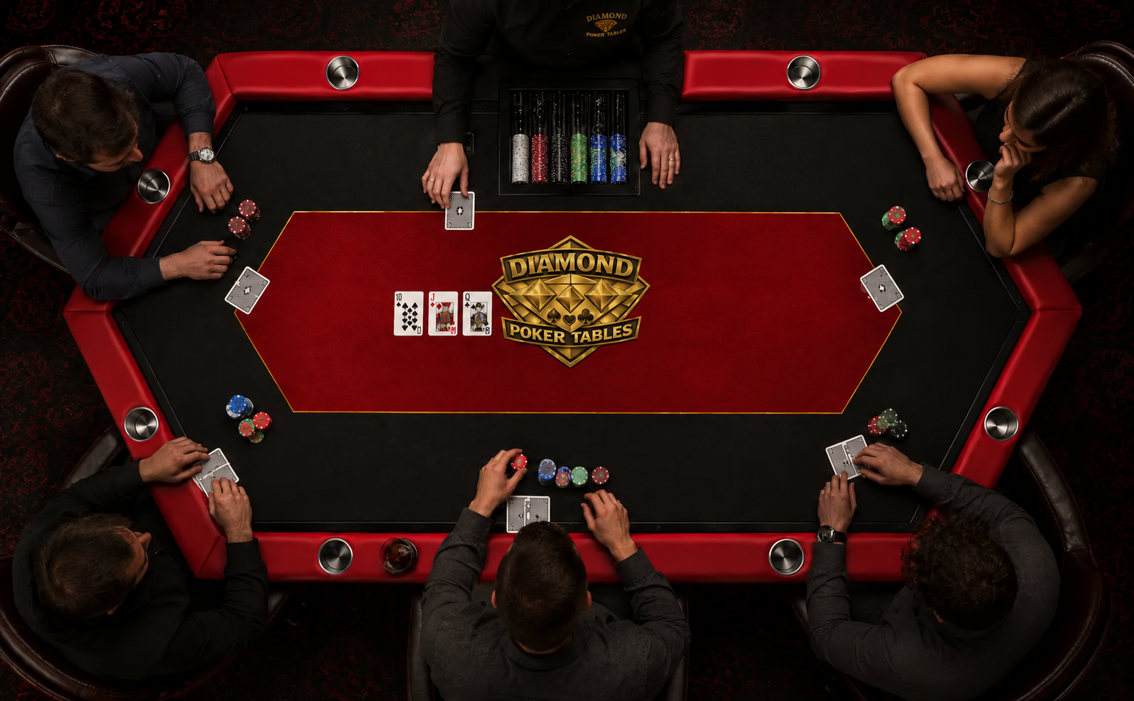 Players gathered around a custom poker table with the Diamond Poker Tables logo